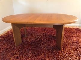 Danish Modern teak Skovby dining table. Extends from 68 1/2” to 108”. Comes with two 19 3/4” self storing leaves