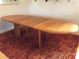 Danish Modern teak Skovby dining table. Extends from 68 1/2” to 108”. Comes with two 19 3/4” self storing leaves