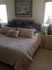 King size down bedding and pillow shams. Bed is made using 2 twins
