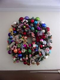 Hand created wreath containing a variety of pieces, some hand made, some blown glass. Outstanding center piece for any home at the Holidays....