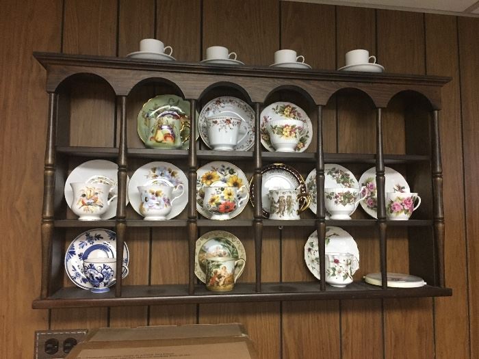 Tea cups/saucers; wall cabinet shelf