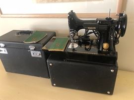 Multiple Singer sewing machines 