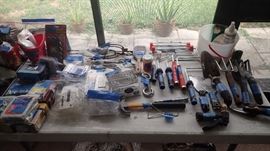 Paint rollers, scrapers, tools and miscellaneous hardware.