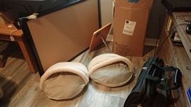 Two new doggy beds. My wife's spoiled dogs... little fur babies won't sleep on them.  Rolling bag, cork boards, small oak side table