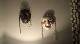 Two cool ceramic masks - comedy and tragedy.