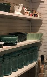 Our pantry is filled with pottery, blue Atlas jars, Chianti bottles from the 1950s, tinwware and kitchen collectibles, aluminum ware.
