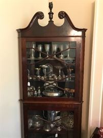 Impressive corner cabinet holds a Collection of Gorham Sterling Silver goblets, and antique napkin rings. Sterling compotes, a nice antique silverplate ice water Pitcher, many special pieces. 
