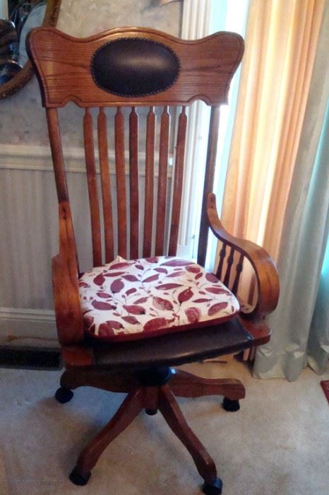 Antique oak desk chair.