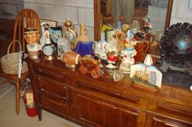 Collection Jim Beam bottles and vintage dresser.