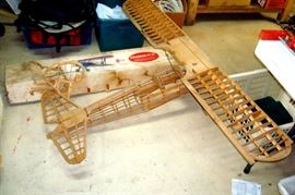 Vintage partially assembled Starman Pt 17 model airplane with original box and parts to complete.