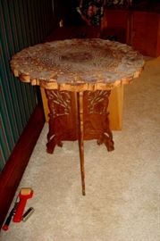 Hand carved oriental table with dusty top