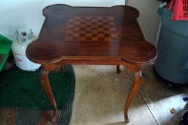 Antique game table.