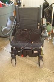 Quickee battery powered wheel chair. (needs new battery)
