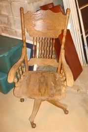 Antique oak desk chair.