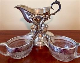 Crystal with silver rims creamer and sugar ..... look at that antique silver gravy server!