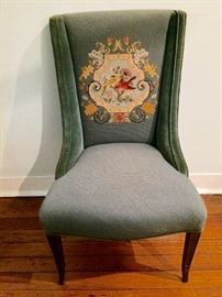 Needlepoint chair! The entire chair is needlepoint except the arms which are blue velvet.
