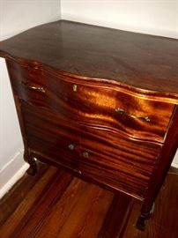 Antique wash stand with bowed top drawer and doors at the bottom to hold a chamber pot.... great condition!