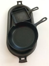 Iron cookware......that bottom piece is rare! Wonder how much chicken that skillet has fried?