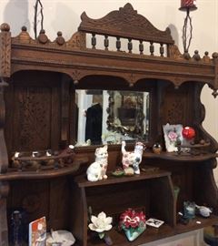 This Victorian piece was once the top of something but now hangs on the wall to display those "special" things!