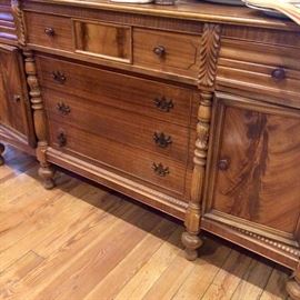 The "flame" on each of the doors makes this a unique piece to be treasured!