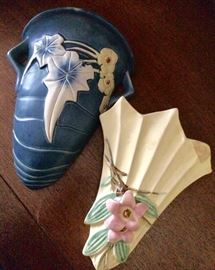 Perfect Roseville blue and white wall pocket. Nice McCoy light yellow wall pocket with pink flowers.