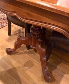 Close-up of the legs and scalloped side apron of the dining table!
