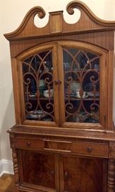 Carved spindles and decorative doors make this an outstanding china cabinet that matches the big sideboard/buffet
