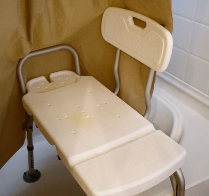 Bath/Tub chair for disabled or handicapped. Provides easier access for people who have difficulty getting in and out of the shower. Adjustable legs.