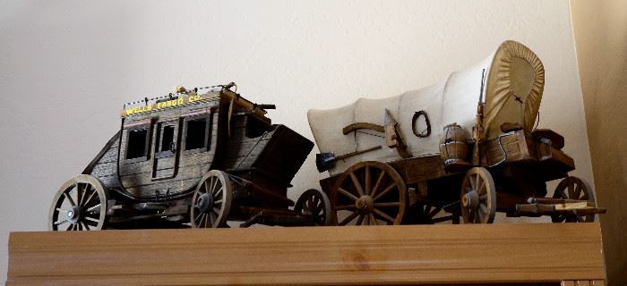Covered wagon and stagecoach.