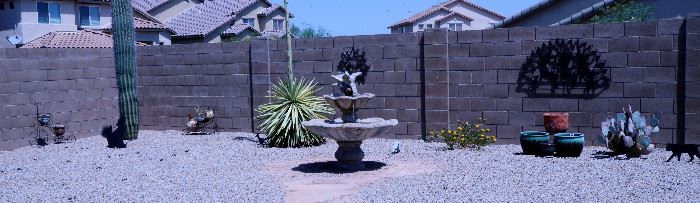 Garden pots and other yard ornaments. Very large cement fountain.