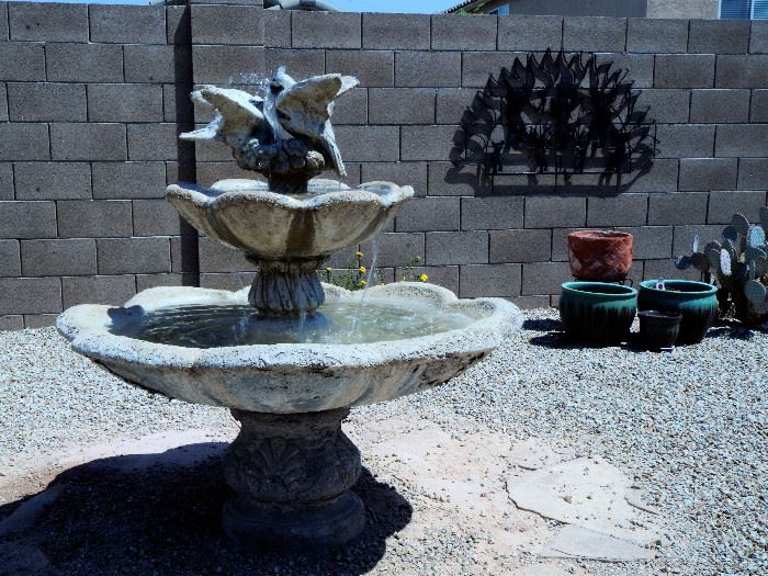 Beautiful large cement fountain and more garden art and pots.