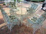 Iron table and 4 chairs set; needs a glass table top.