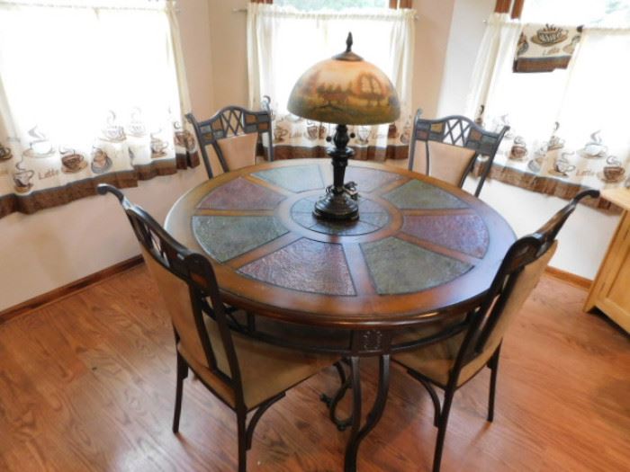 Round dining room table with chairs