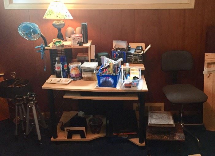 Desk, office chair, small office supplies, lamps, desk fan