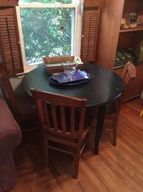Drop Leaf dining table and three wood chairs