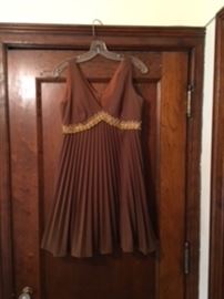 60s pleated vintage dress stored in cedar closets. All clothing stored in Cedar closets