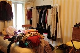 1960's and 1970's clothing in one of the upstairs guest rooms. Ladies and Gentlemen, don't miss this room!!