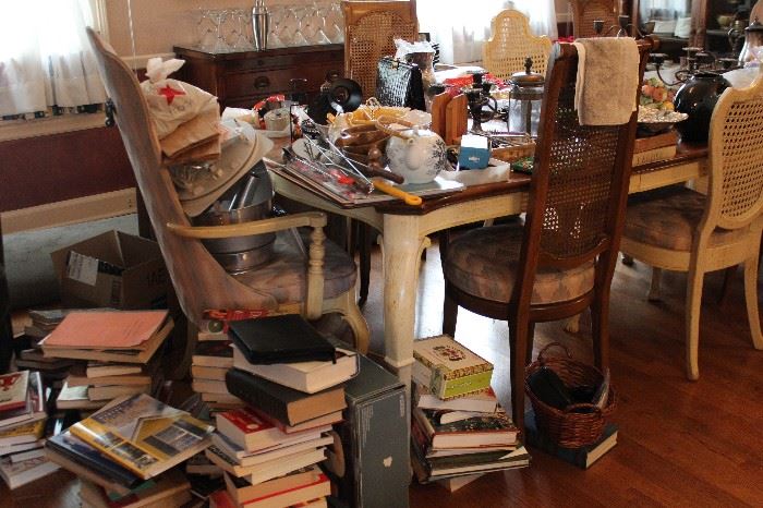 Dining Room cane backed chairs books, art, art books, dining set