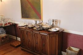 Painting by Barbara Pinder Silver serving pieces buffet cabinet chess
