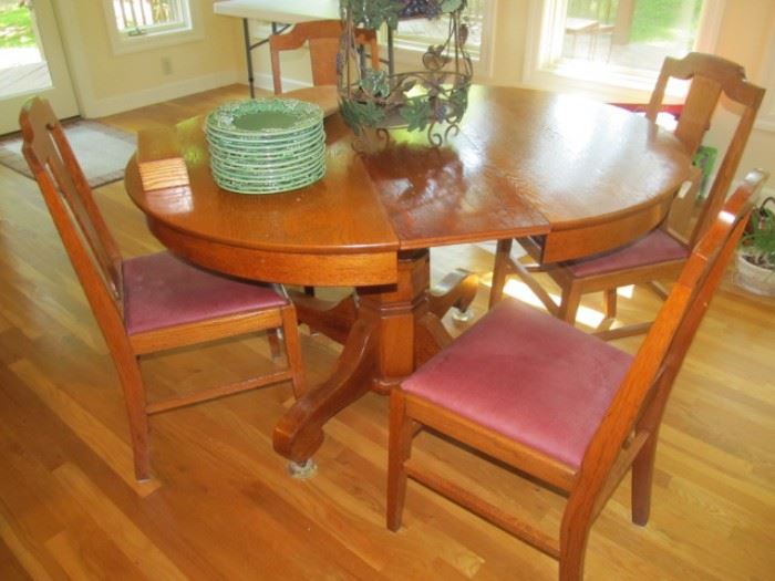 oak kitchen table with 2 pine leaves and 4 chairs