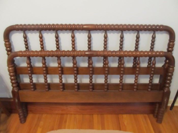 One of 2 full size Jenny Lind beds