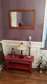 Mirror, red bench, misc. lamps