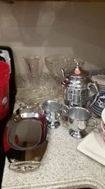 Chrome coffee service, chrome serving tray, cut glass items.