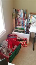 We have Christmas wrapping paper & ribbons & bows!