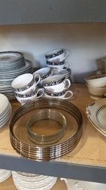 Silver-edged glass buffet plates.