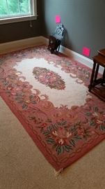 Large, pink medallion rug