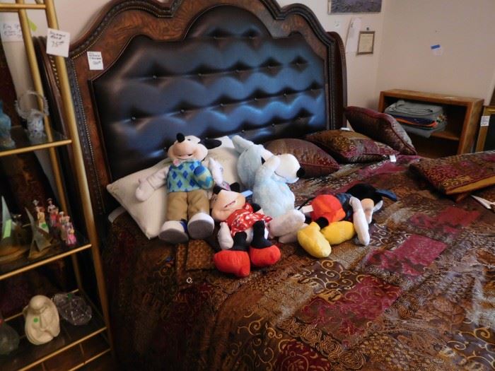 King  size  bed  and  mattress  set,many  stuffed  animals  in  Master  Bedroom and  are  mostly  made  by  Disney
