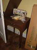 Stitchmaster 660Z Sewing Machine with manual and cabinet.