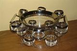 Roly poly punch set with holder in original box.