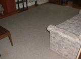 Textured Berber rug 9'6" x 13'9" all edges bound. Lovely neutral colors. Rolled up and ready to go!